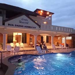 Enjoy the swimming pool at Bua Daeng Homestay Resort